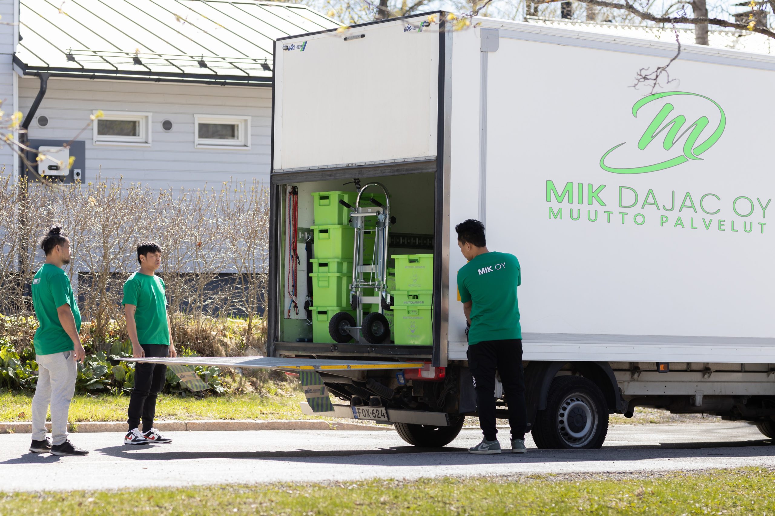 Mik Oy 18 cubic meter moving truck being loaded for a residential move in Espoo