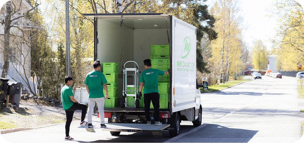 Mik Oy moving team loading the Mik Dajac Oy truck in Helsinki -- professional moving services with transparent pricing in 2026